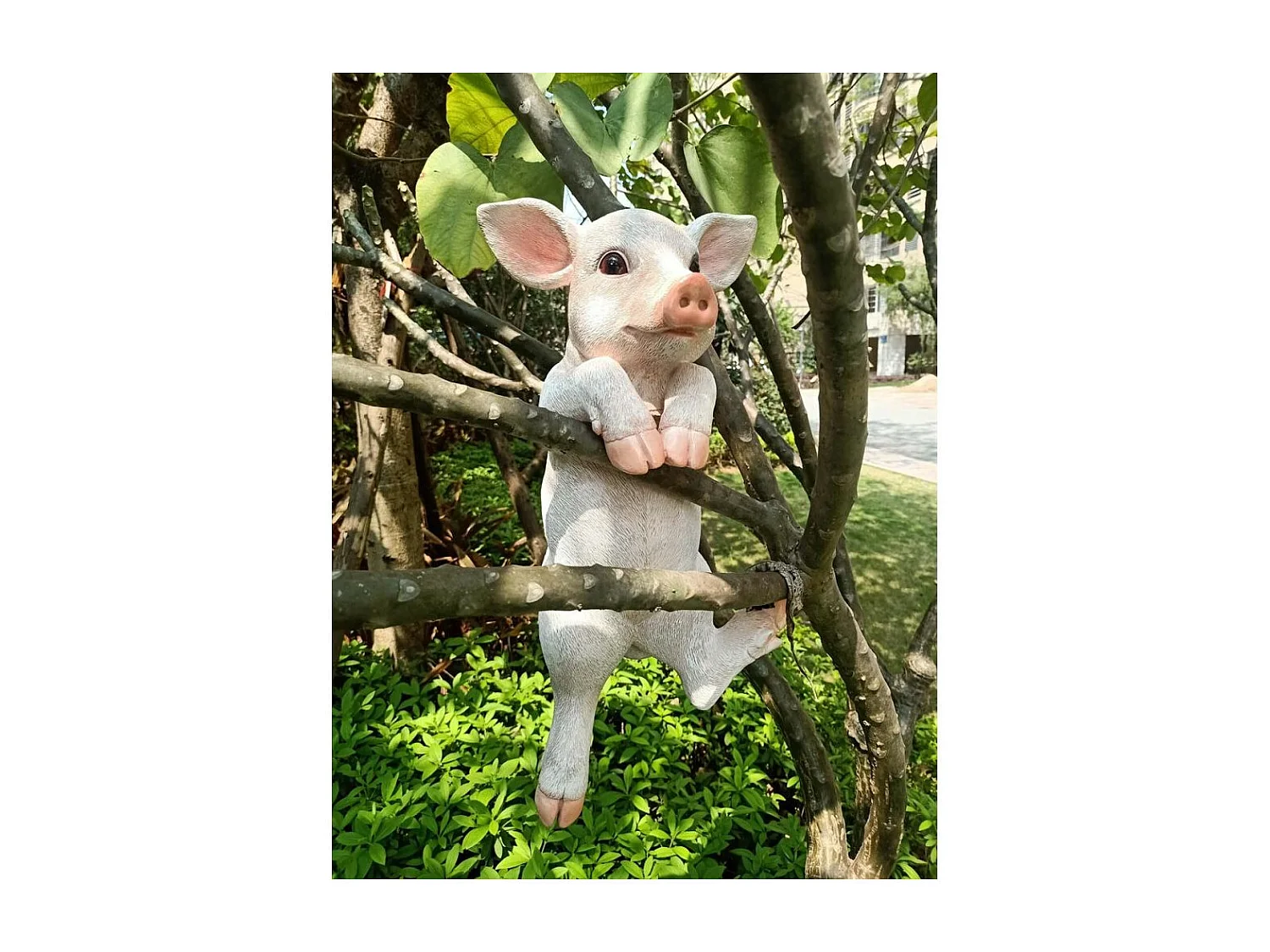 Cochon sur bord en résine 49.5 x 21 x 25 cm