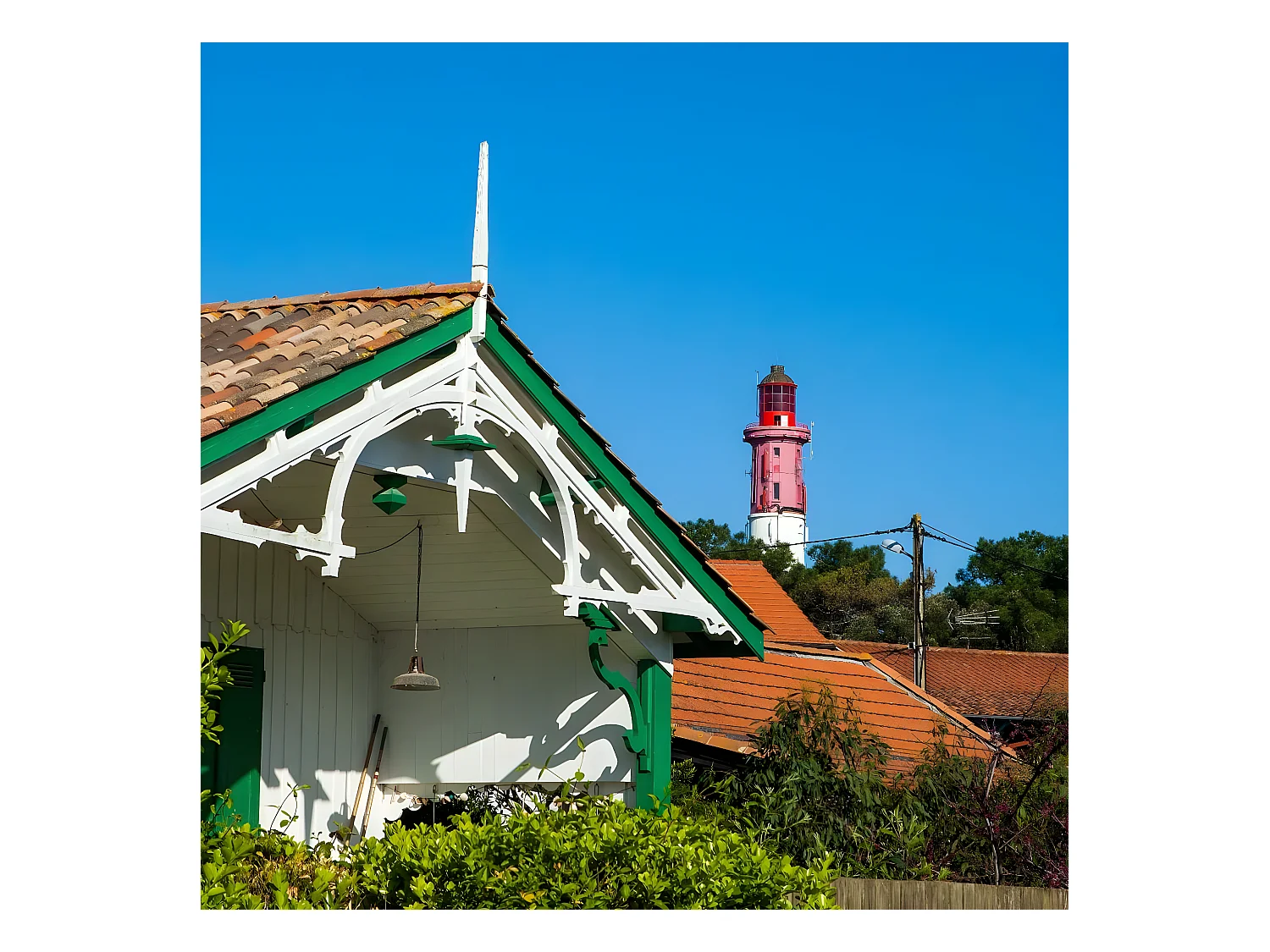 Tableau sur verre cabanes phare Cap Ferret 30x30 cm
