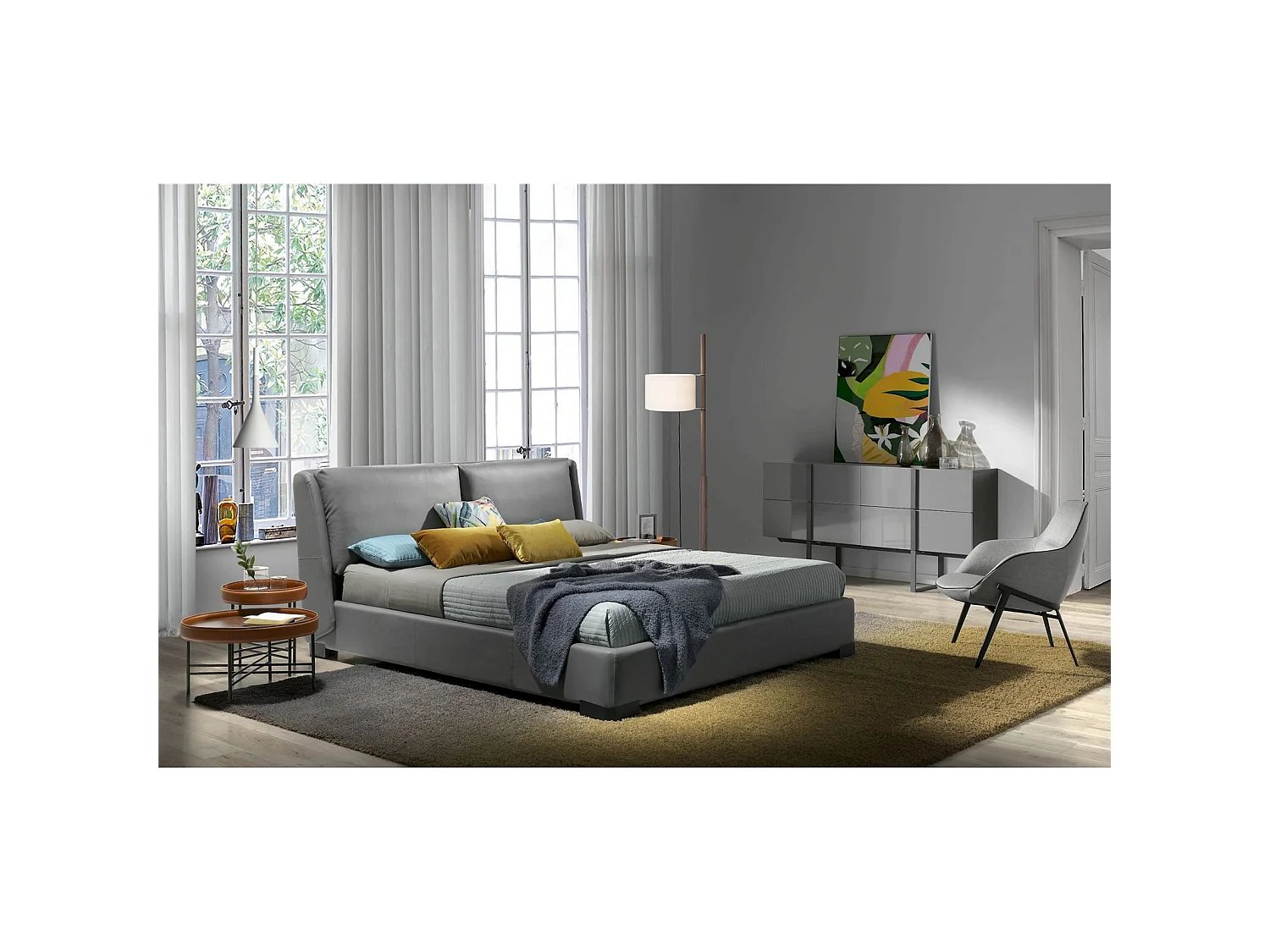 Table basse ronde bois anneau circulaire rembourré de cuir pieds acier peint époxy