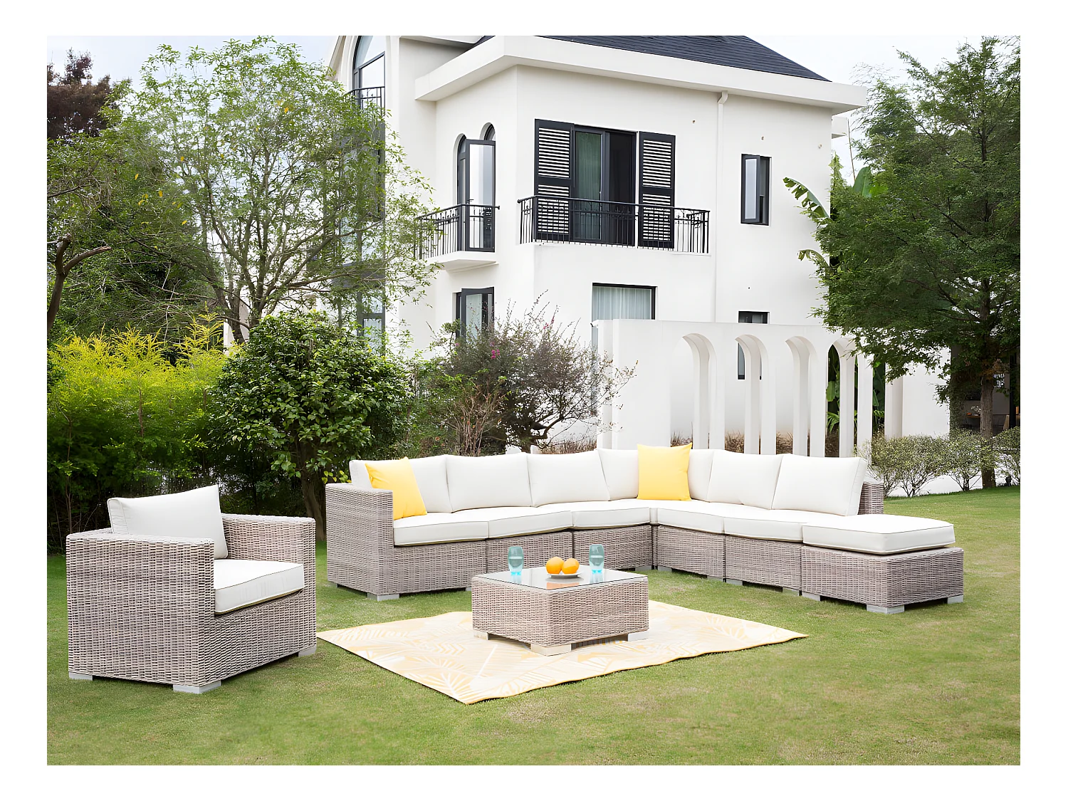 Poltrona da giardino in resina intrecciata con cuscini bianchi - BUSAN di MYLIA