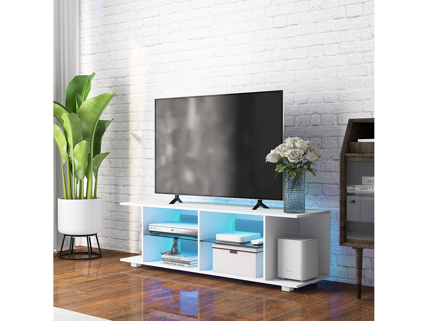 Meuble banc TV sur pieds avec lumières LED - 2 étagères en verre trempé pour télévision jusqu'à 60 pouces style contemporain - 145 x 40 x 45 cm blanc