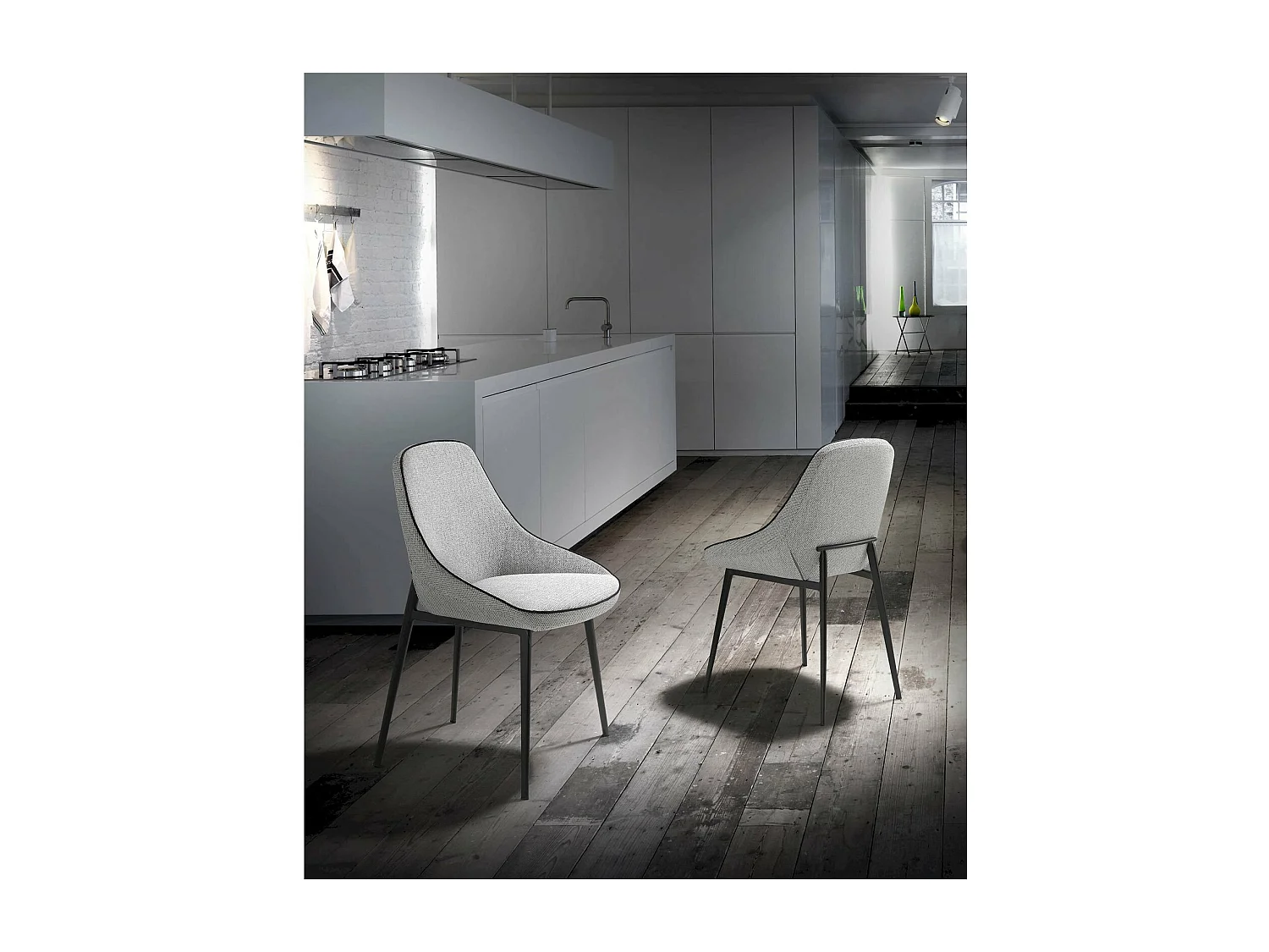 Chaise de salle à manger rembourrée en tissu pieds acier peint époxy