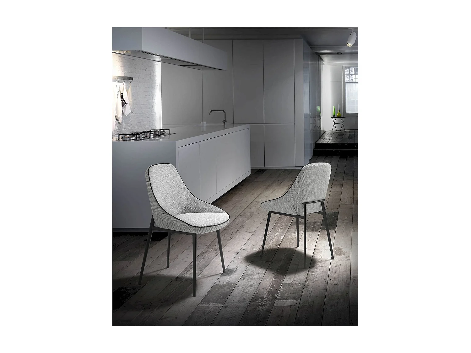 Chaise de salle à manger rembourrée en tissu pieds acier peint époxy