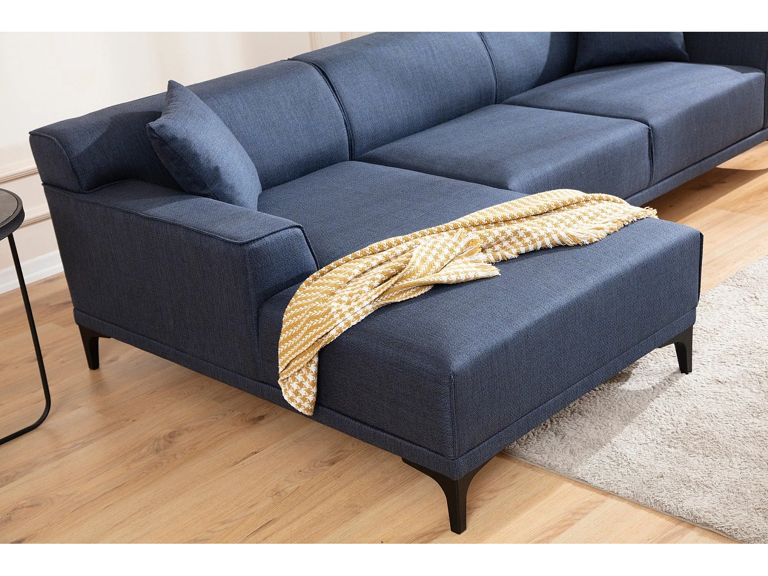 Moderne hoekbank links in blauwe stof met 2 kussens Tivano 250 cm