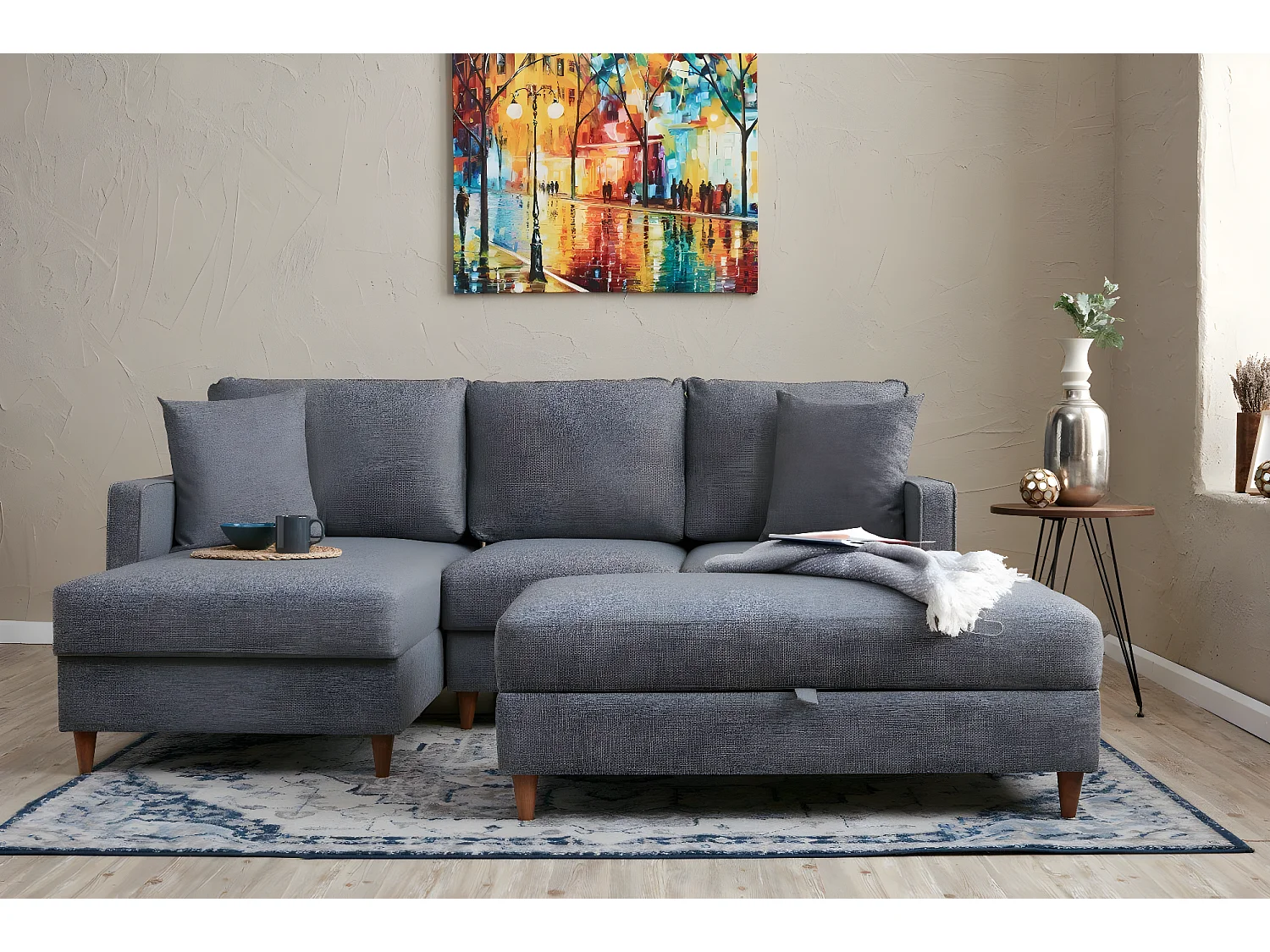 Canapé d'angle à gauche convertible avec pouf-coffre Evania Tissu Gris