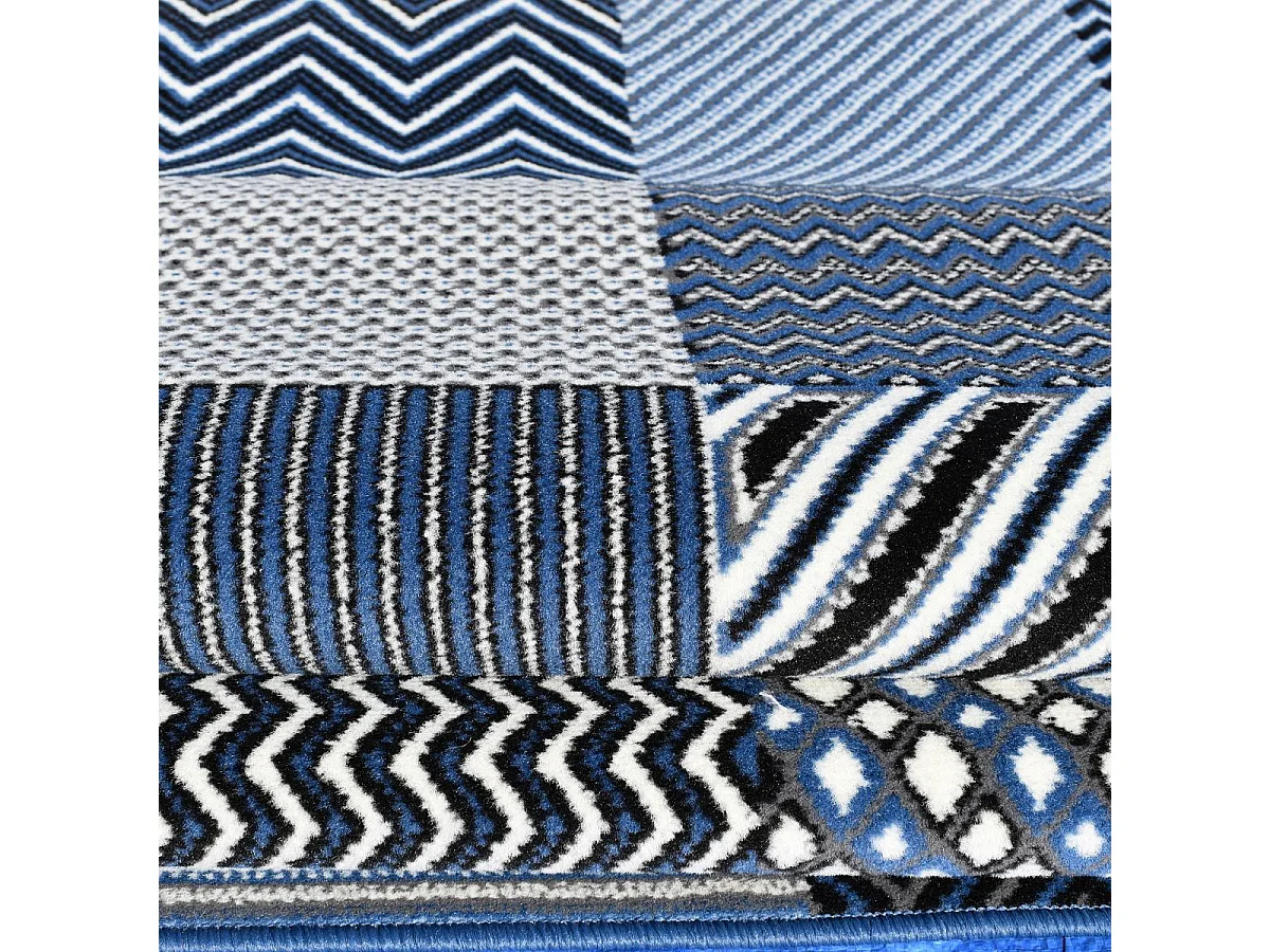 tapis chambre 60x110 tissé bleu rectangle motif géométrique LYN1 GEOTREM