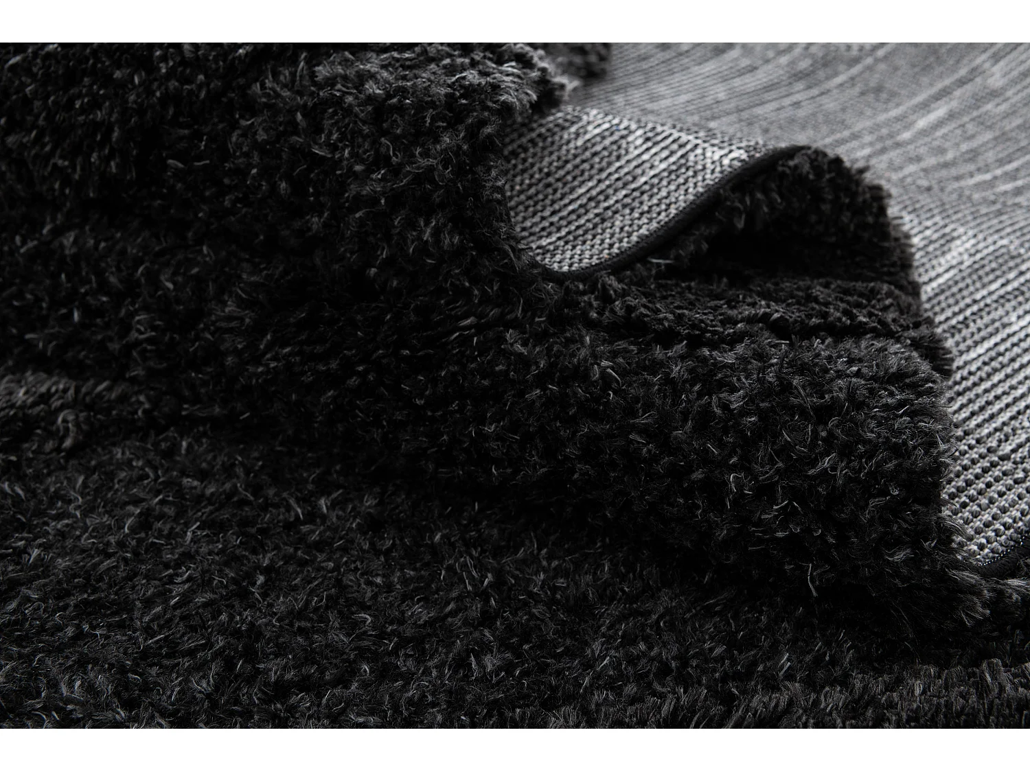 Tapis shaggy 125x185 noir Thun Tribus