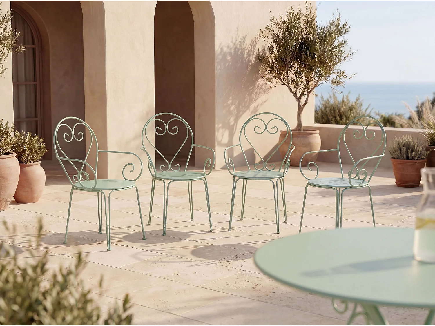 Lot de 4 fauteuils de jardin empilables en métal façon fer forgé - Vert amande - GUERMANTES de MYLIA