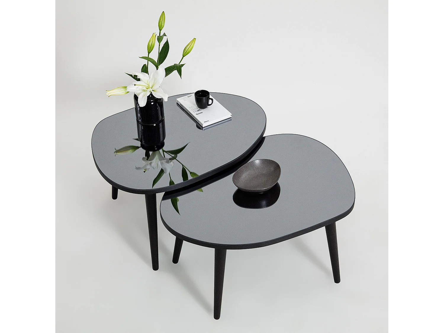 Set de 2 tables basses trépied ovale gigognes Casina Bois Noir et Verre trompé Miroir fumé