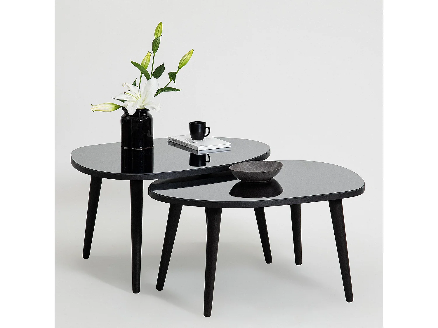 Set de 2 tables basses trépied ovale gigognes Casina Bois Noir et Verre trompé Miroir fumé