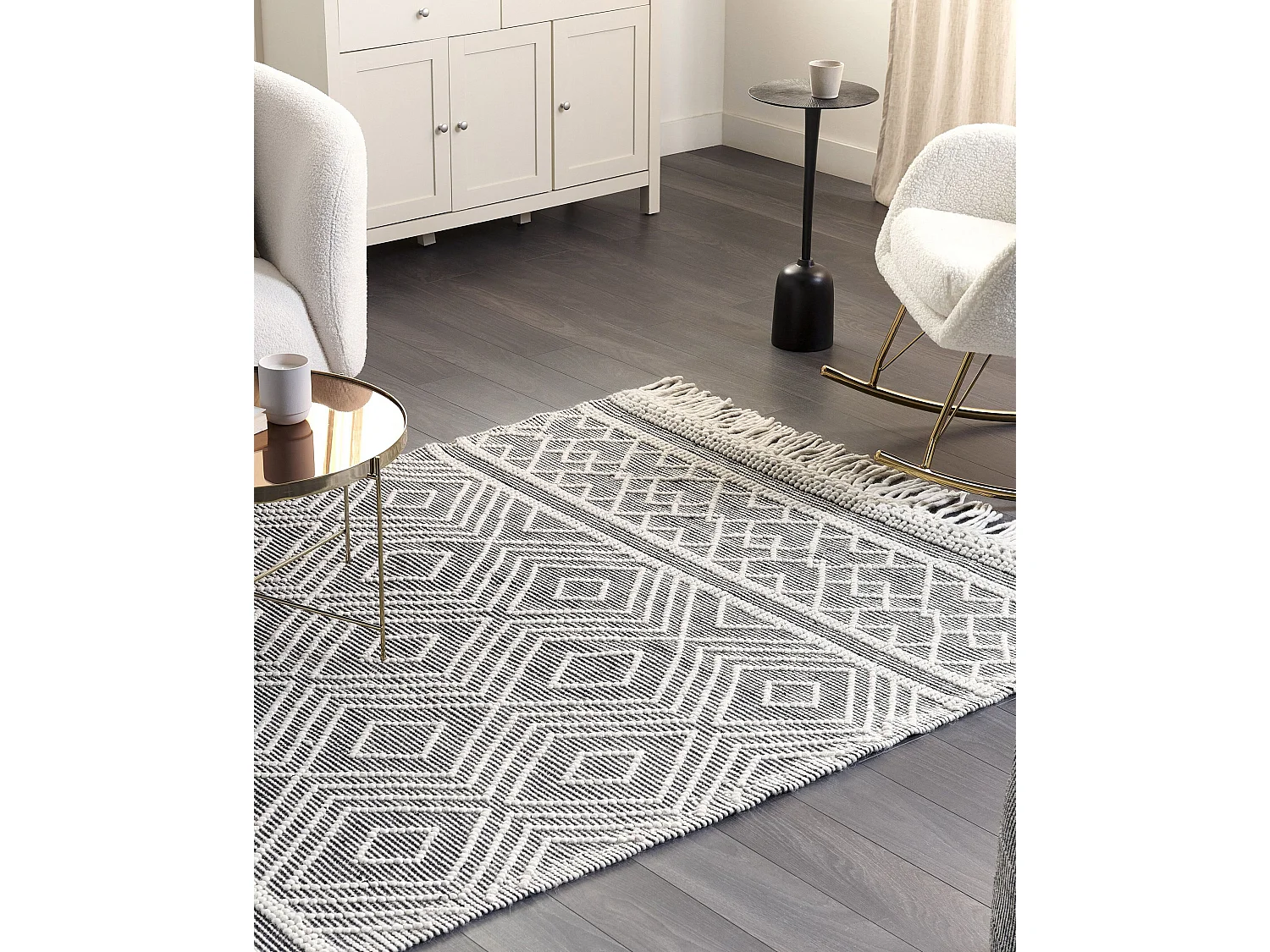 Teppich schwarz / weiß aus Wolle 160 x 230 cm Kurzflor mit Fransen modern Savuca