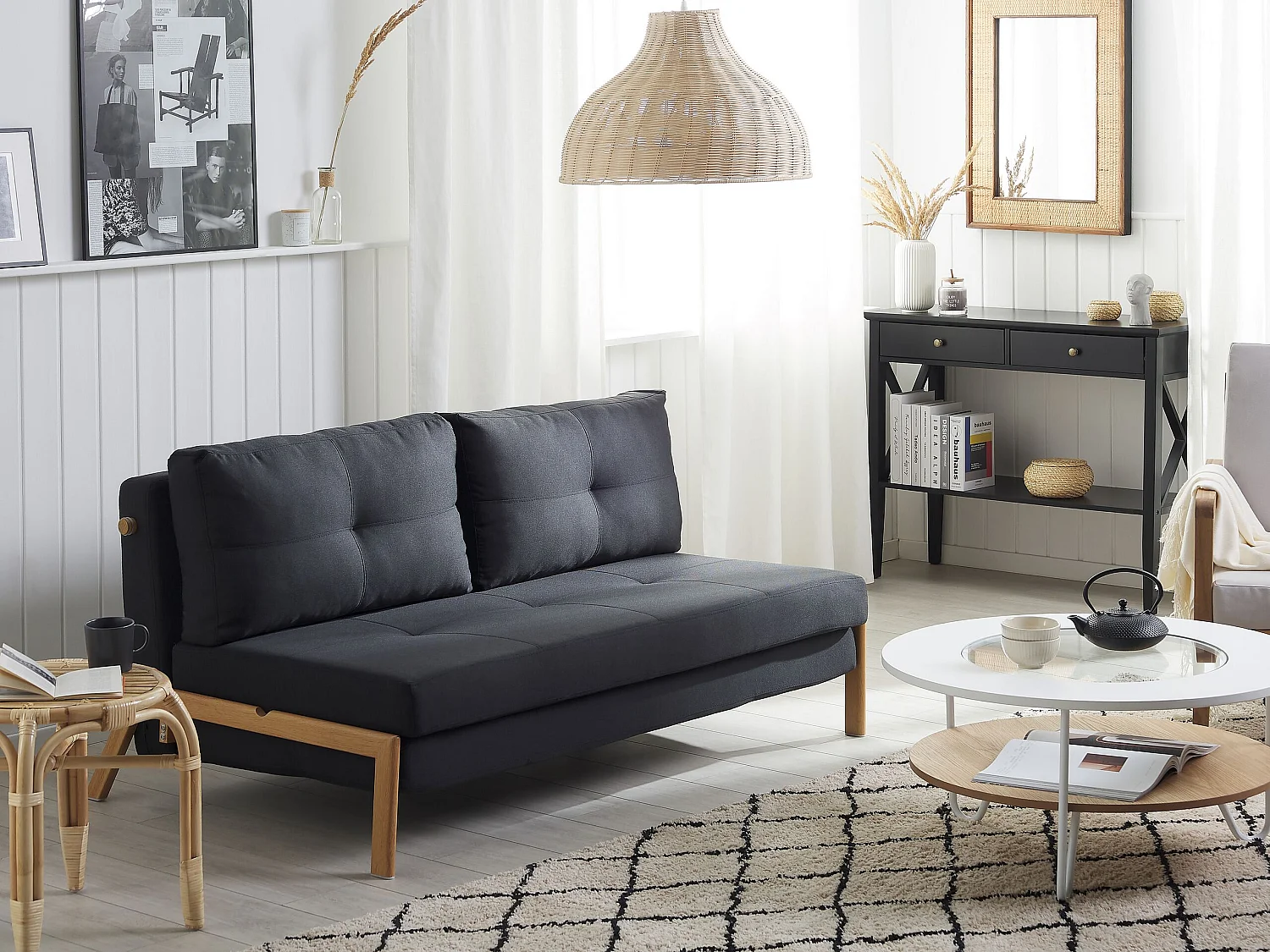 2-Sitzer Schlafsofa Stoffbezug schwarz gesteppt hohe Metallbeine Skandi Edland