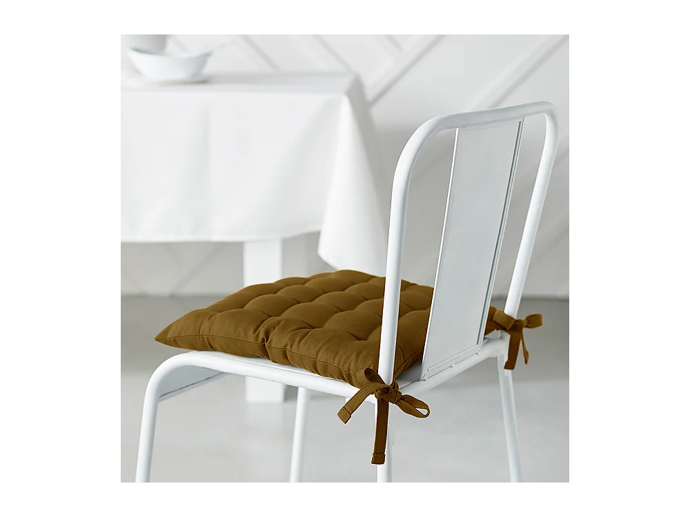 Coussin de chaise en tissu de coton et rempli de fibre creuse de silicone. Bronze