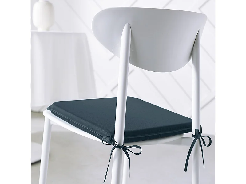 Coussin de chaise en tissu 100% polyester et rempli d'une base en mousse. Bleu pétrole