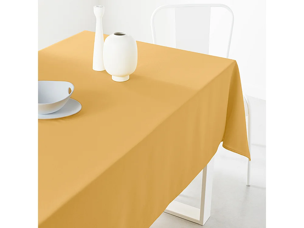 Nappe rectangulaire 100% polyester de couleurs unies. Mesure : 150x250cm Ocre