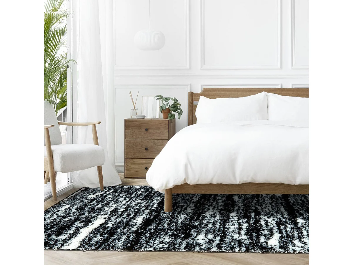 Tapis shaggy 200x290 rectangle tissé noir et blanc motif faux uni EMBER