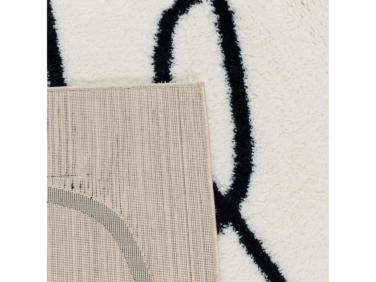 Tapis longs poils shaggy 80x150 rectangle tissé blanc et noir