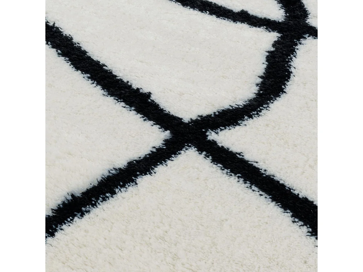 Tapis longs poils shaggy 120x160 rectangle tissé blanc et noir
