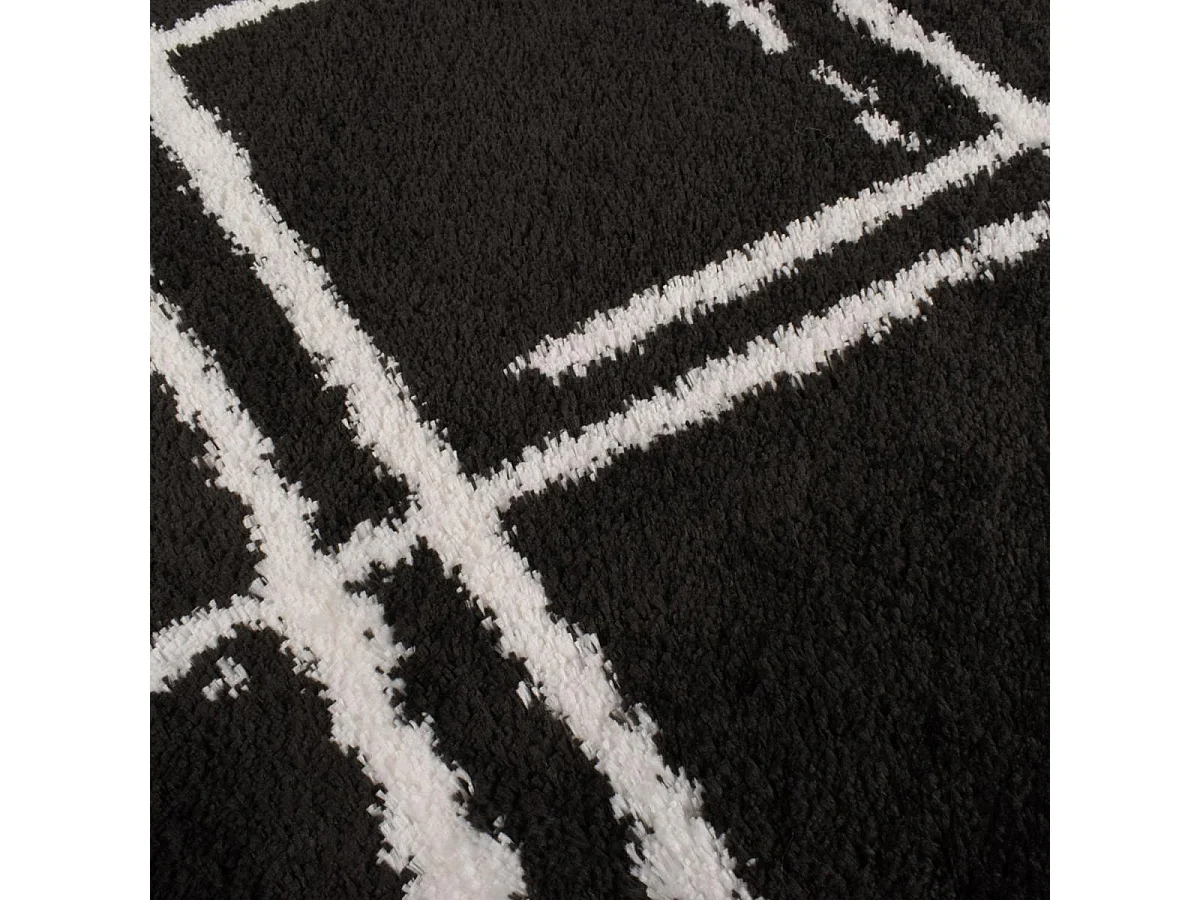 Tapis shaggy 200x290 rectangle tissé noir et blanc motif géométrique EMBER 1
