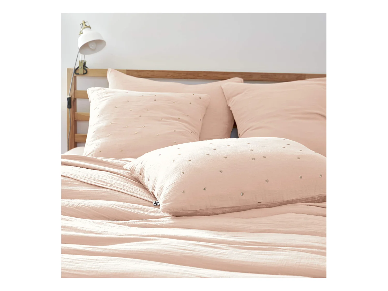 Taie d'oreiller à pois brodés double gaze de coton rose 60x60 cm