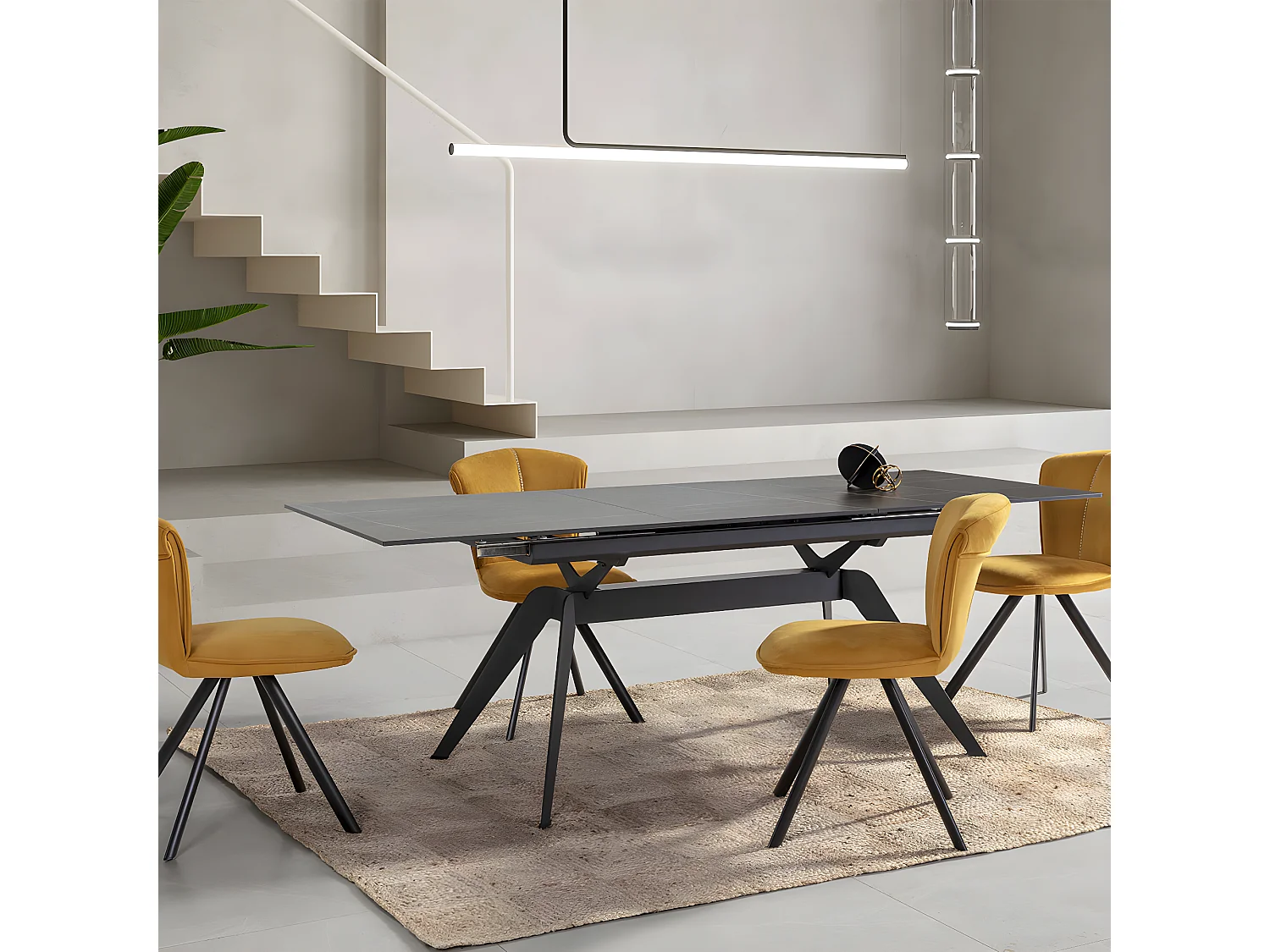 Table à manger rectangulaire extensible en céramique noir / doré 160/220 cm - Lally