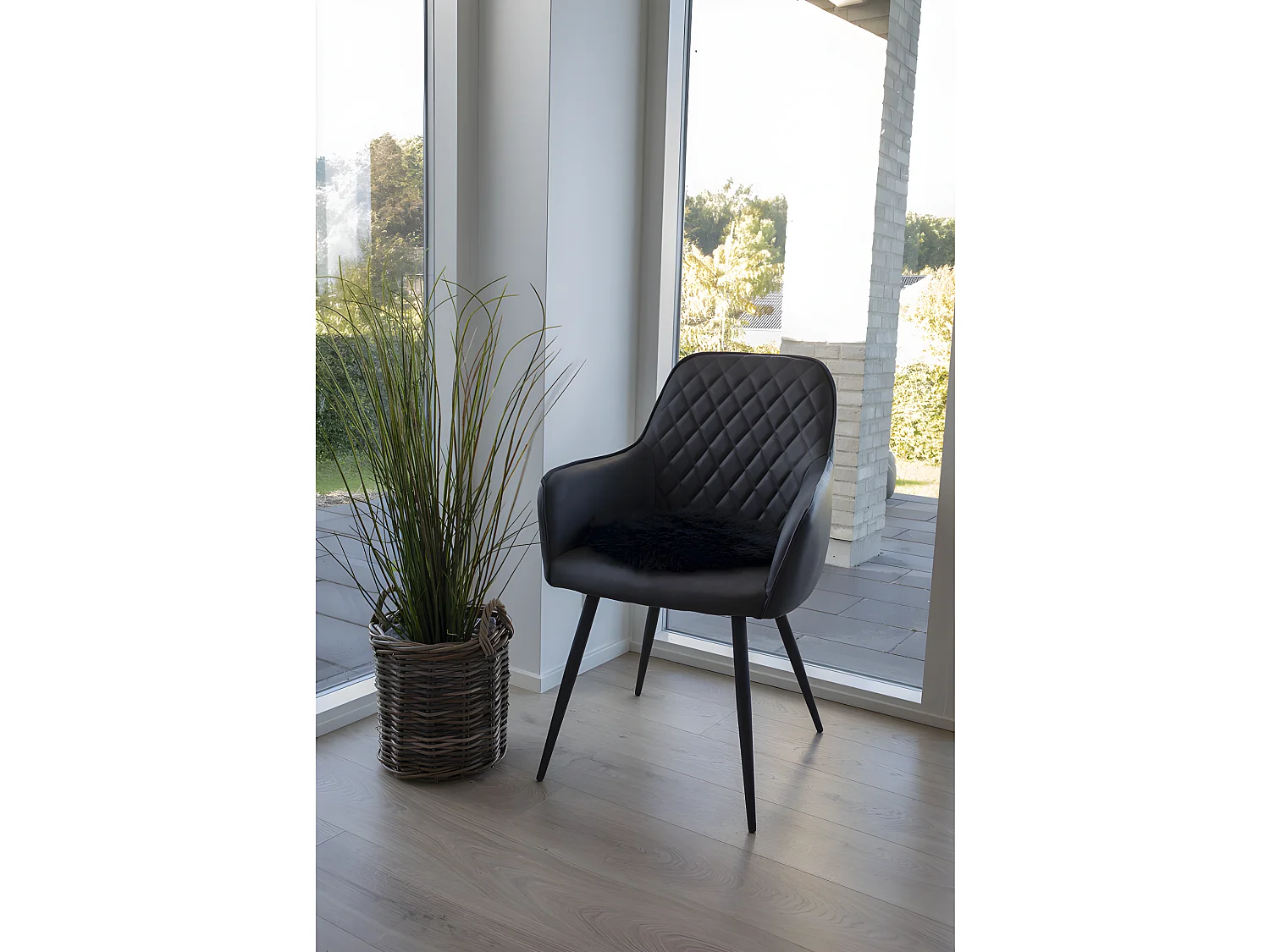 Lipo Sitzkissen echtes Lammfell, schwarz.