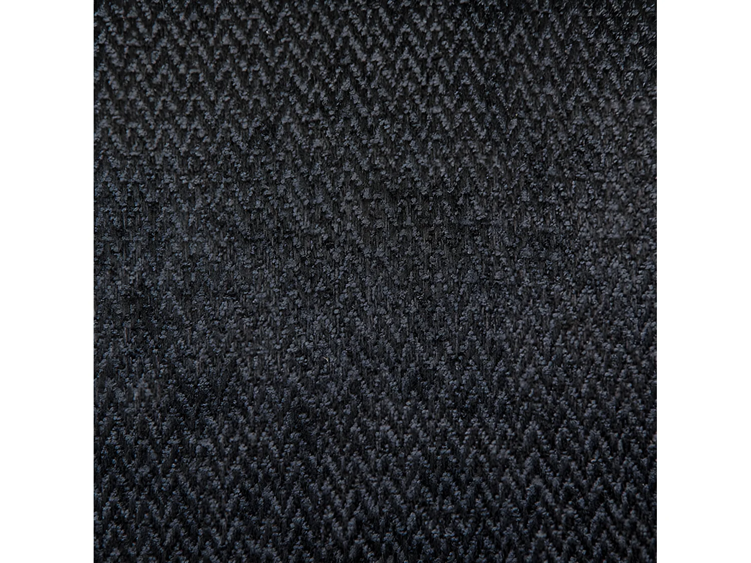 Lone Sessel in dunkelgrau mit Walnuss Beinen.