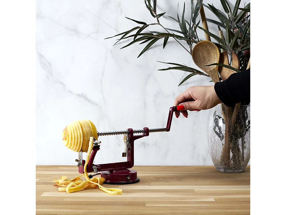 Pèle pomme en métal Beige