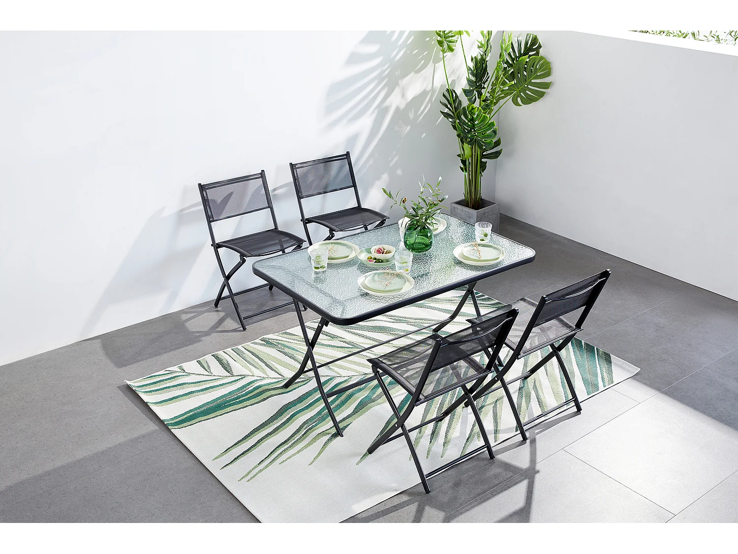 Tuinset MAHON met tafel en 4 inklapbare stoelen van staal en gehard glas