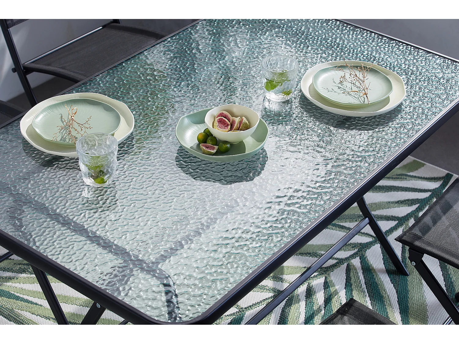 Tuinset MAHON met tafel en 4 inklapbare stoelen van staal en gehard glas