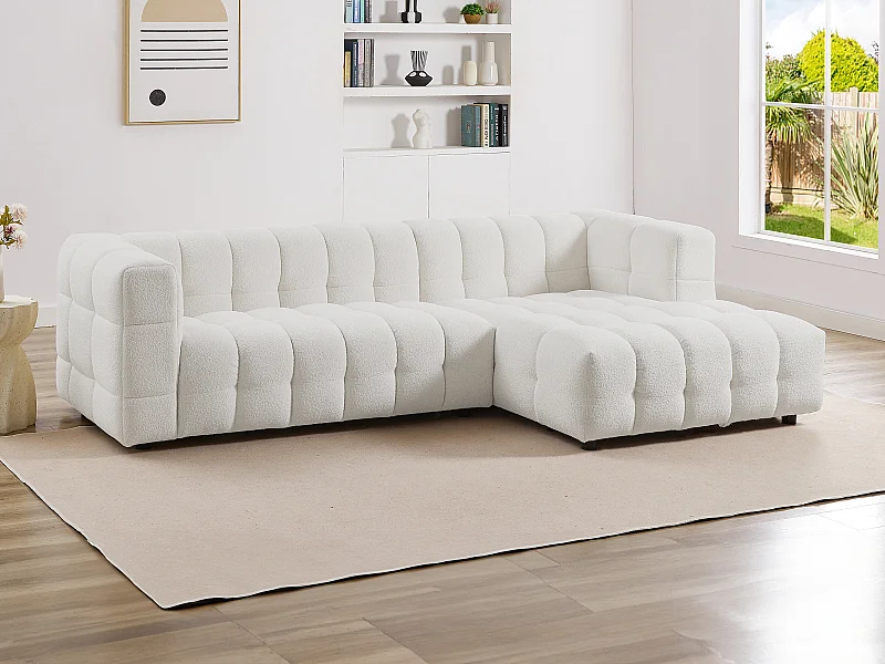 Høyrevendt hjørnesofa i kremmerhvit bouclé-stoff LERICI av Pascal Morabito