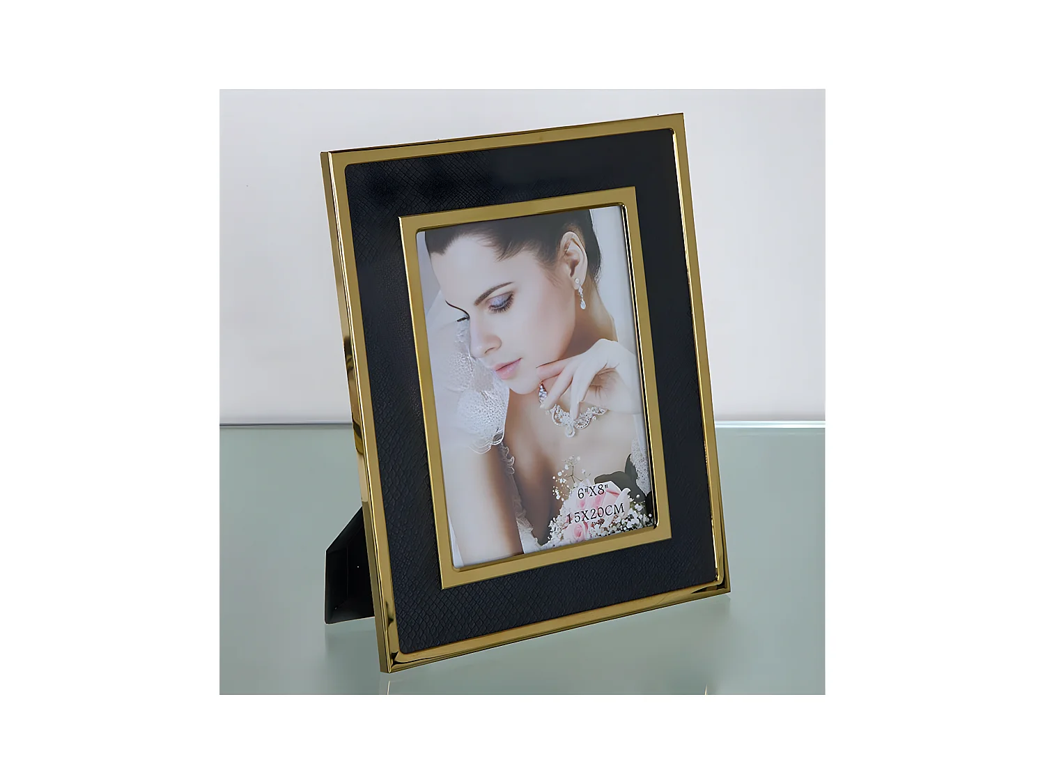 Portafoto 15*20 pu negro serpiente metal dorado sintra