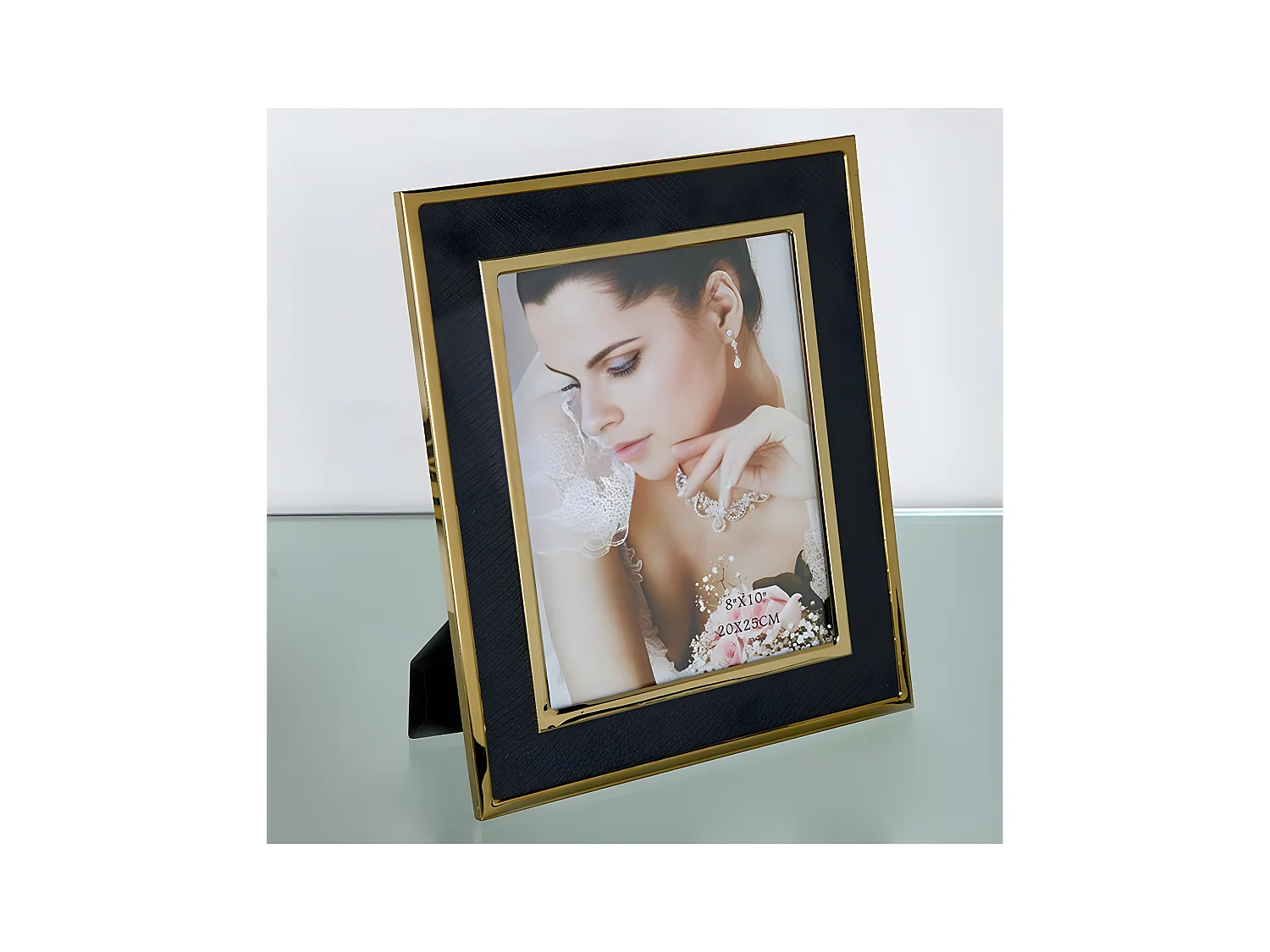 Portafoto 20*25 pu negro serpiente metal dorado sintra