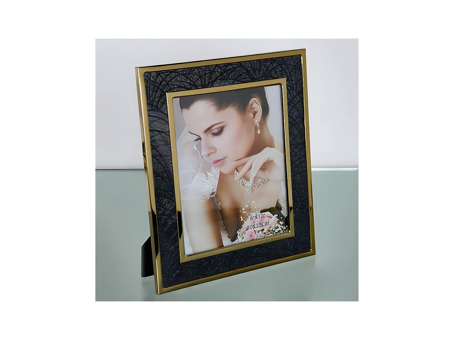 Portafoto 20*25 pu negro ondas metal dorado sintra