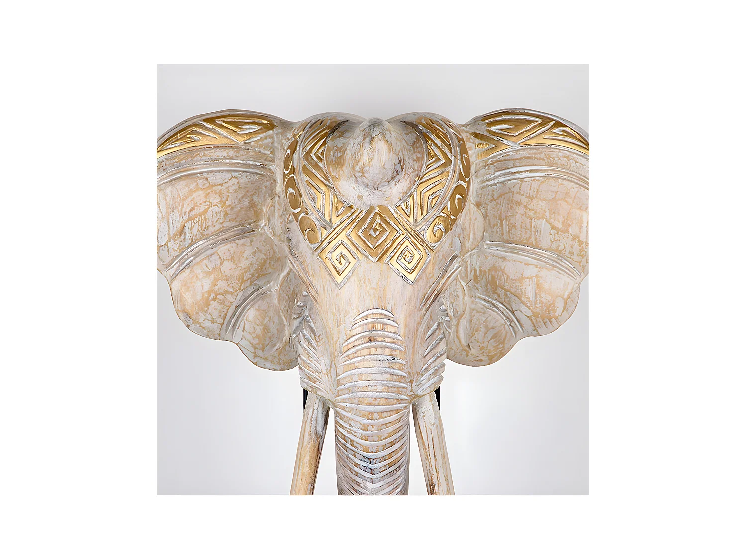Cabeza de elefante nacarada con detalles dorados de madera mogambo