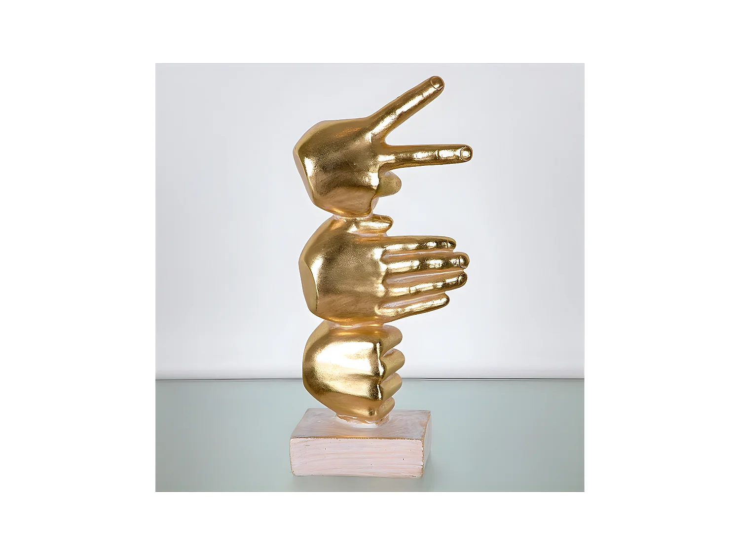 Figura manos jugando a piedra papel tijera de color dorado ontario