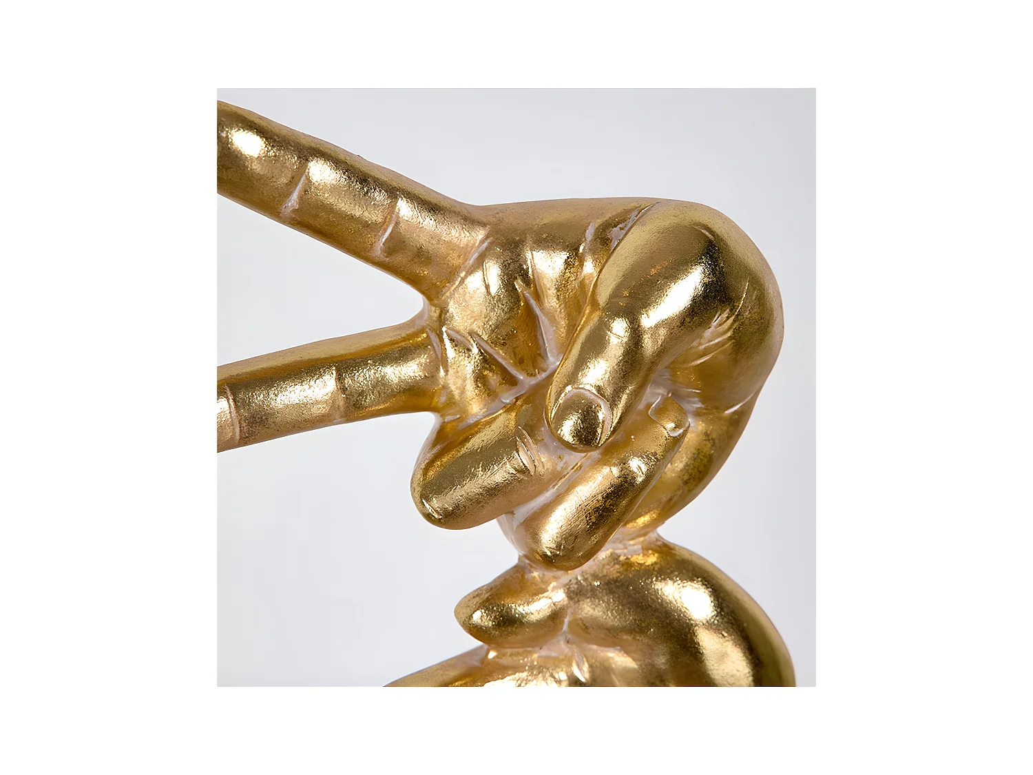 Figura manos jugando a piedra papel tijera de color dorado ontario