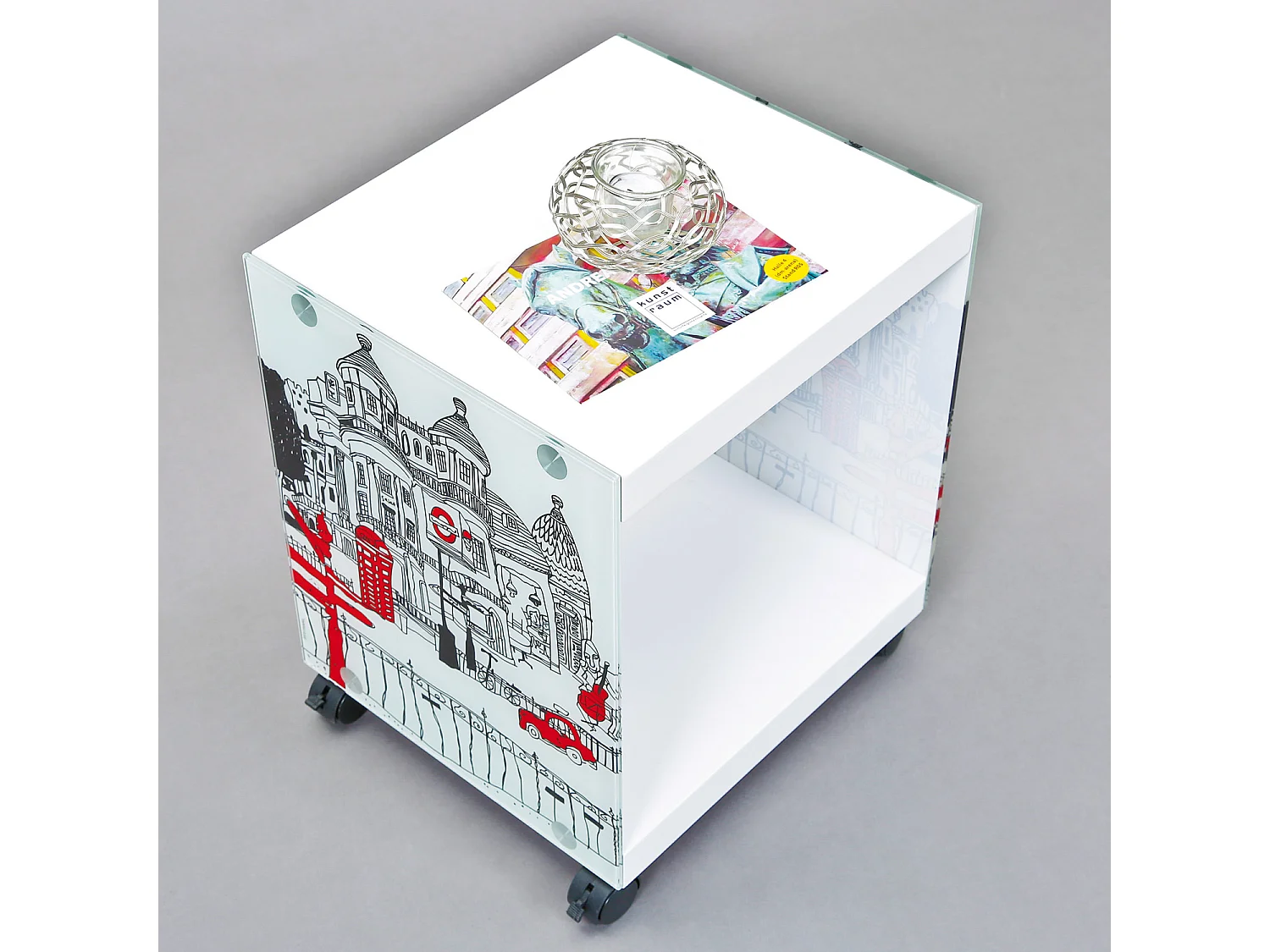 Lance Couchtisch mit Glasseiten weiss und gefärbt.