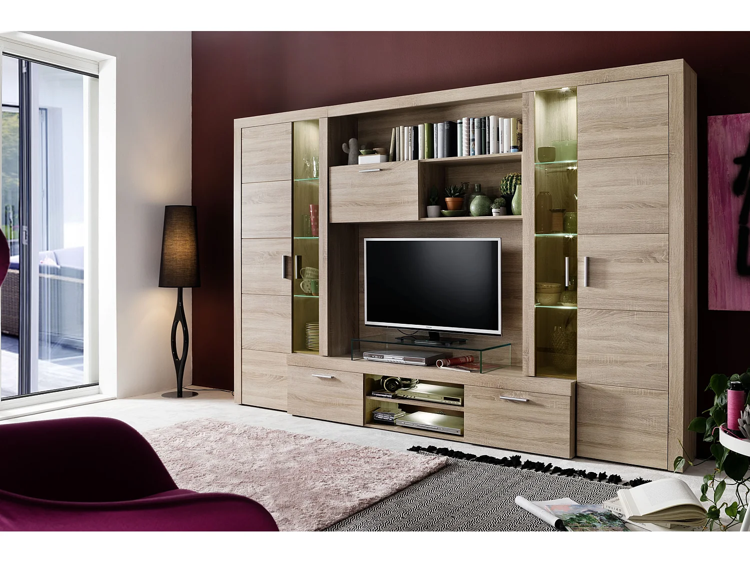 Molar Meuble de salon 4 portes, 5 tablettes de rangement et 3 portes pliantes, lumière incluse, finition chêne.