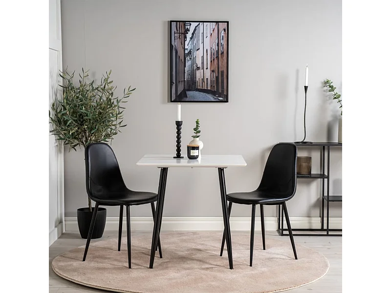 Silla de comedor Polar piel sintética color negro.