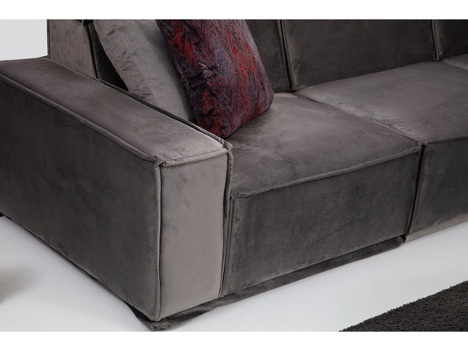 Canapé d'angle à gauche 4 places modulable avec 4 coussins Buhaj Velours Gris