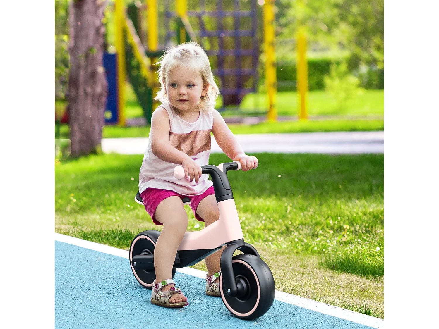 Bicicleta sin pedales rosa 66.5x34x46.5 cm AIYAPLAY