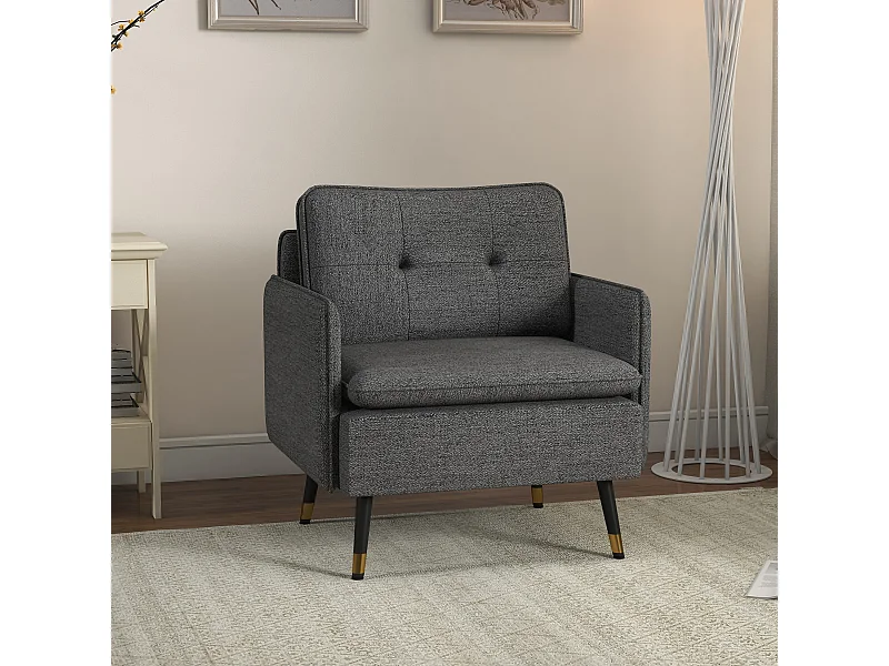 Fauteuil style art-déco dossier effet capitonné piètement incliné effilé métal noir extrémités dorées tissu anthracite