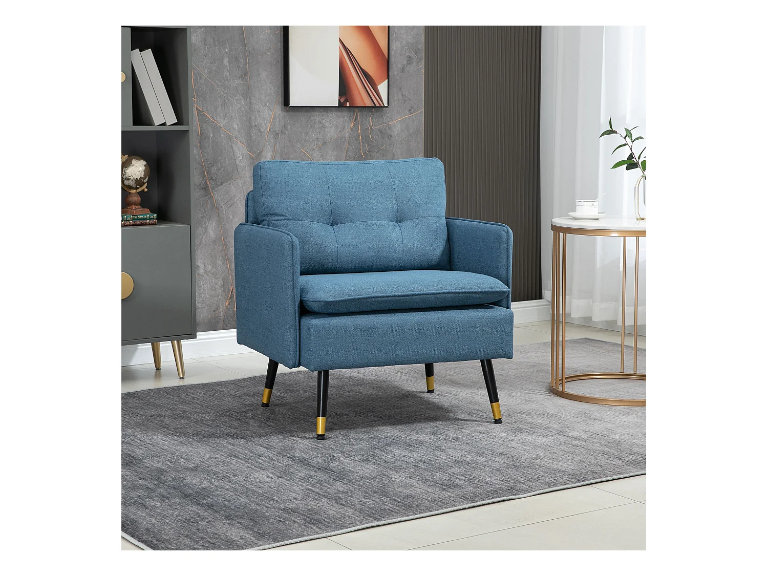 Fauteuil style art-déco dossier effet capitonné piètement incliné effilé métal noir extrémités dorées tissu bleu