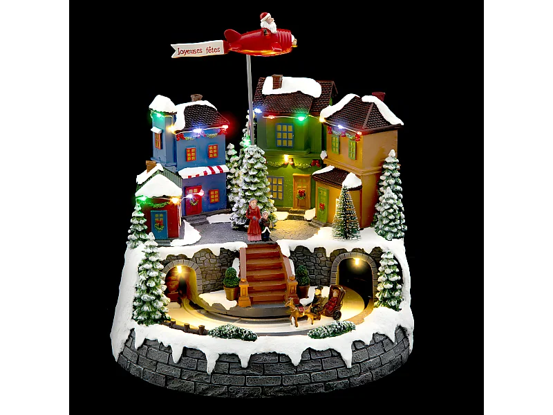 Village de Noël lumineux et animé avec Avion en mouvement
