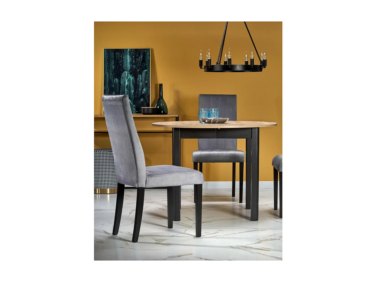 Tavolo da pranzo industriale rotondo allungabile con piano in rovere e gambe nere CARENE