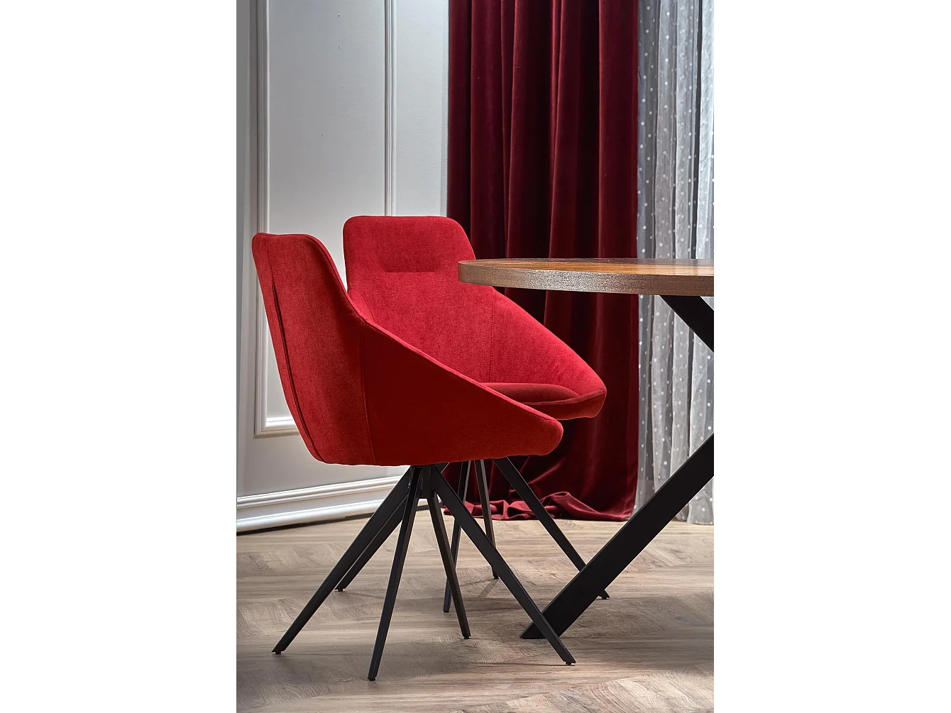 Tavolo da pranzo ovale con piano impiallacciato in noce e base in metallo nero design BENDIS