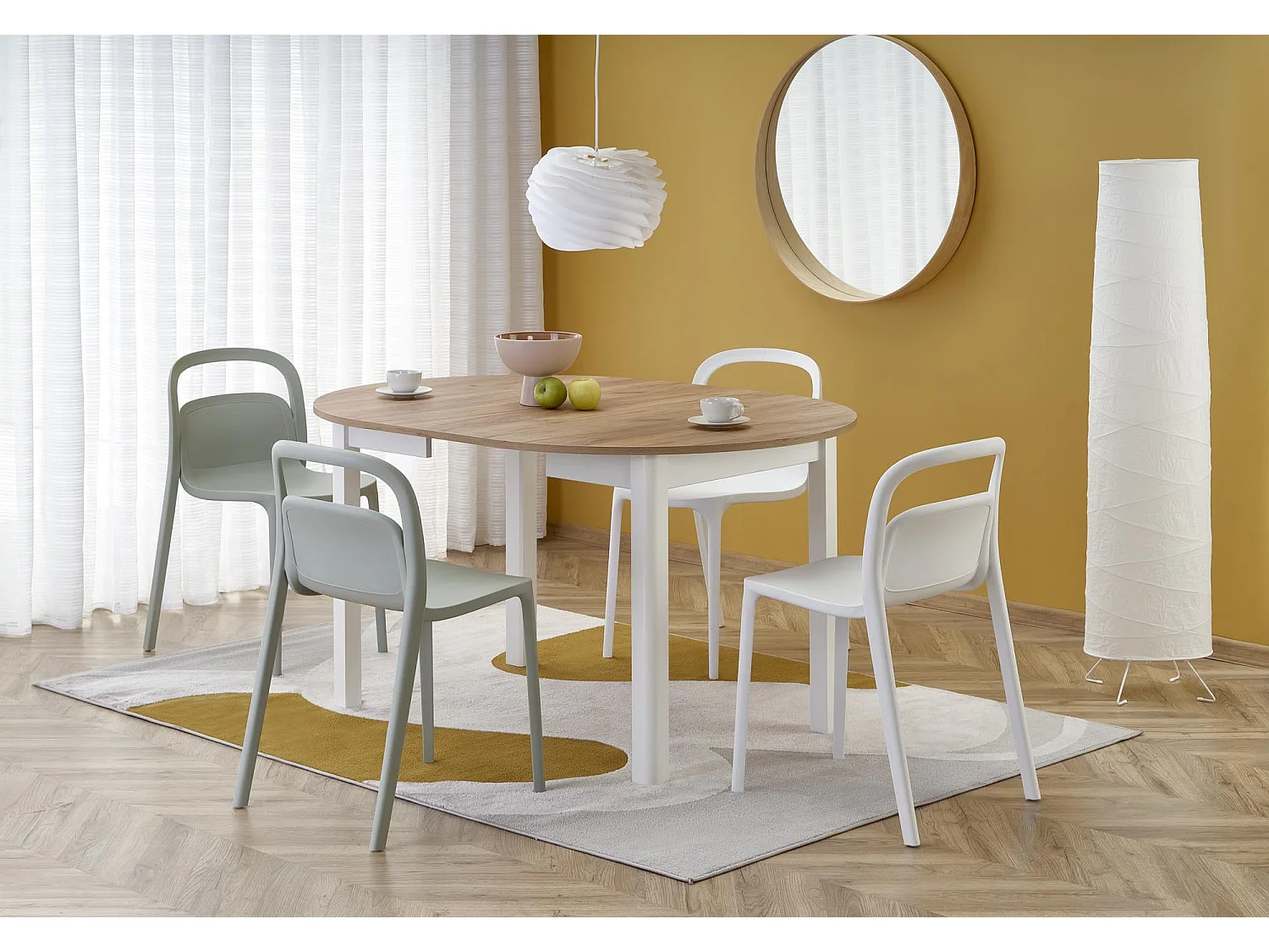 Mesa de comedor redonda extensible de 100 cm con tablero de aspecto roble y patas blancas CARENE