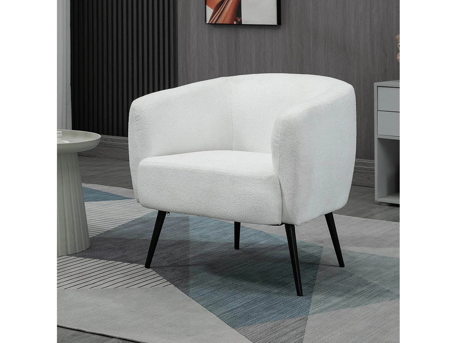 Fauteuil lounge design - piètement effilé incliné métal noir - revêtement effet laine bouclée blanc cassé