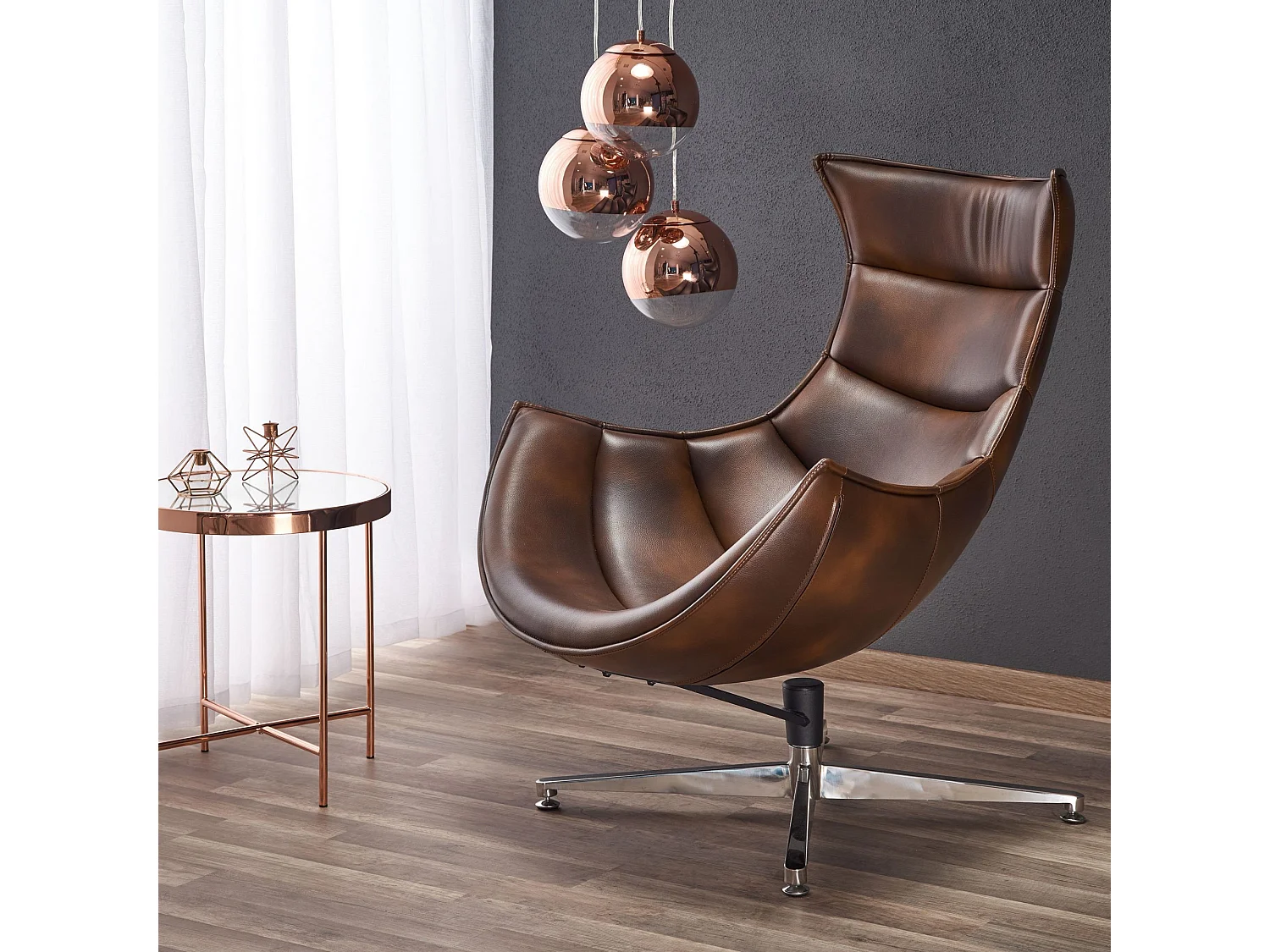 Sillón giratorio de diseño en piel envejecida con base de acero inoxidable Oliver